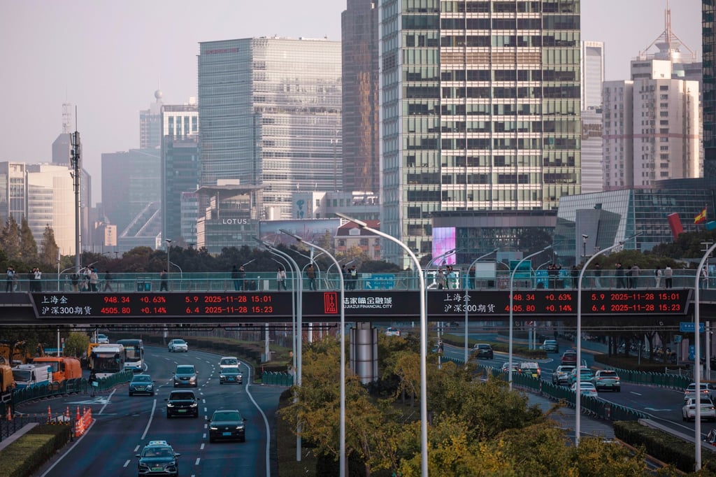 Stock exchange and economy data is displayed on an electronic board in Shanghai. Photo: EPA