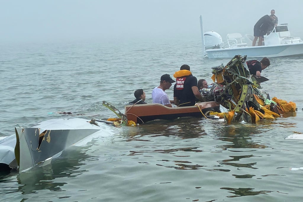 Authorities and volunteers respond to a fatal plane crash near Galveston, Texas. Photo: Sky Decker Jnr via AP
