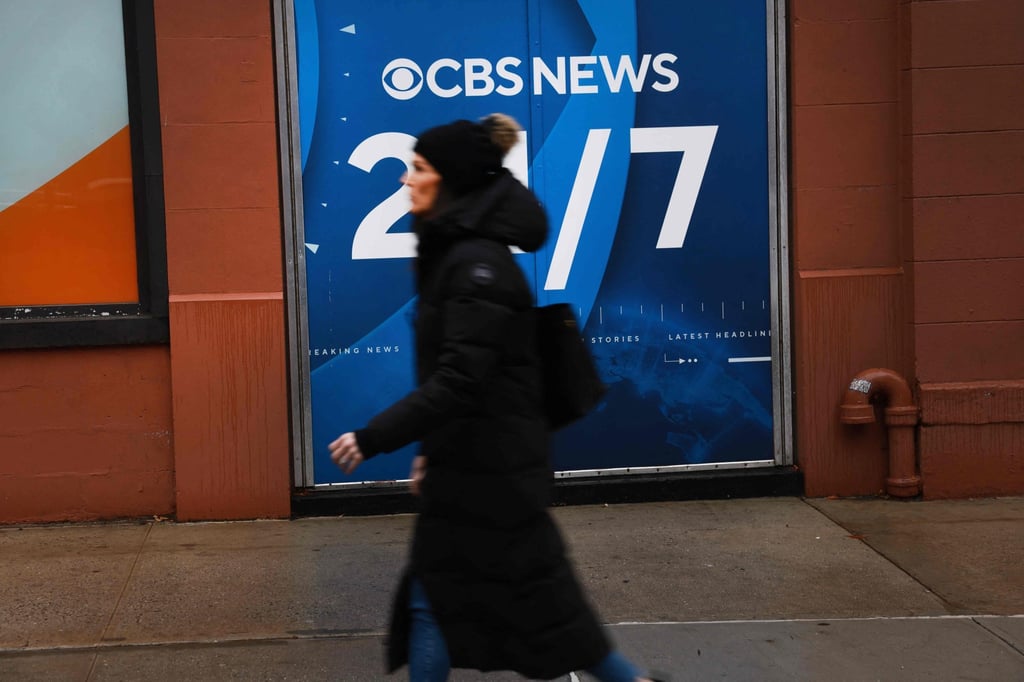 A woman walks past the CBS Broadcast Centre in New York on Tuesday. Photo: AP