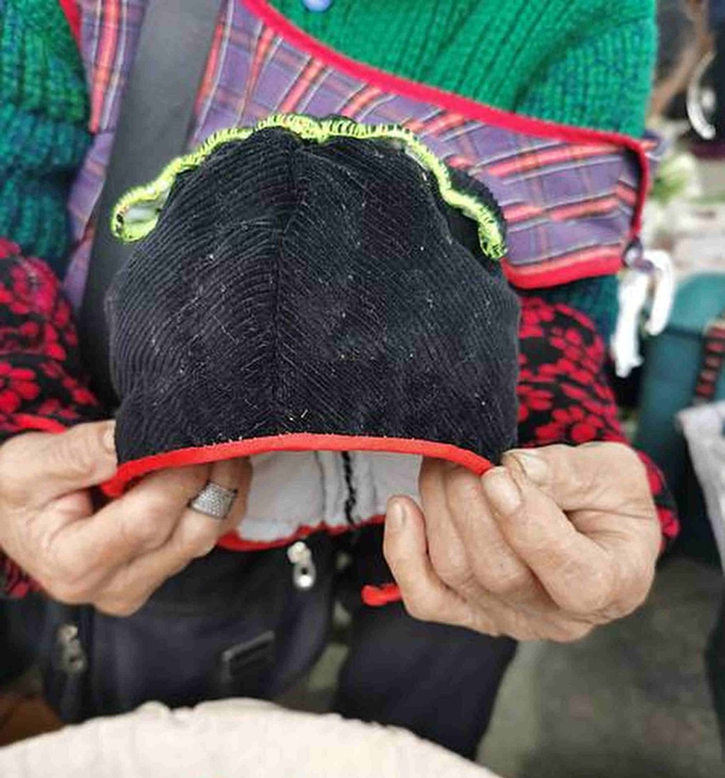 An older version of a so-called dog-head hat. The cosy headgear is often worn in winter. Photo: wldsb.com