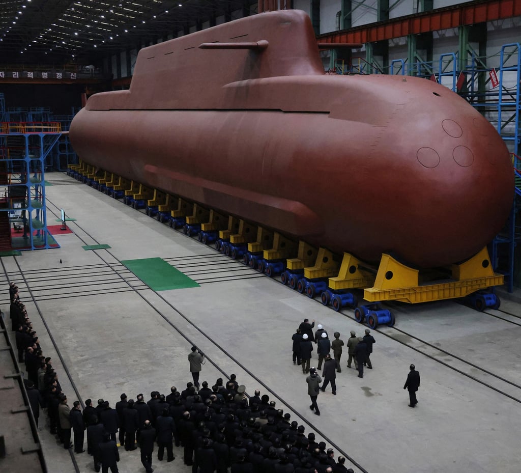 The scale of a nuclear-powered submarine under construction in North Korea can be seen in a photo released on December 25. Photo: KCNA/AP