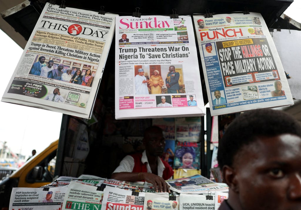Newspapers reporting US President Donald Trump’s message to Nigeria over the treatment of Christians are seen at a newspaper stand in Lagos, Nigeria, in November. Photo: Reuters