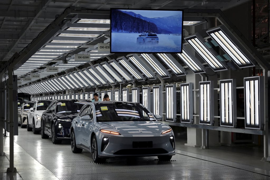 Employees are seen working at Chinese electric vehicle maker Nio’s production line in Hefei, capital of eastern Anhui province. Photo: Reuters