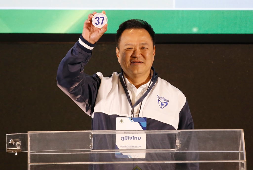 Anutin Charnvirakul draws number 37 for Bhumjaithai Party’s campaign during election registration in Bangkok on Sunday. Photo: EPA