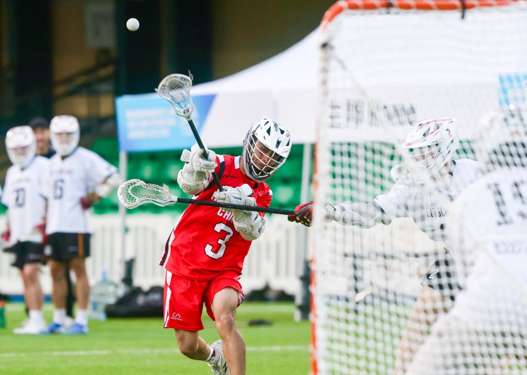 Hong Kong’s Lam Chung-yung take a shot during his side’s Hong Kong International Lacrosse Sixes semi-final against Germany. Photo: Jonathan Wong