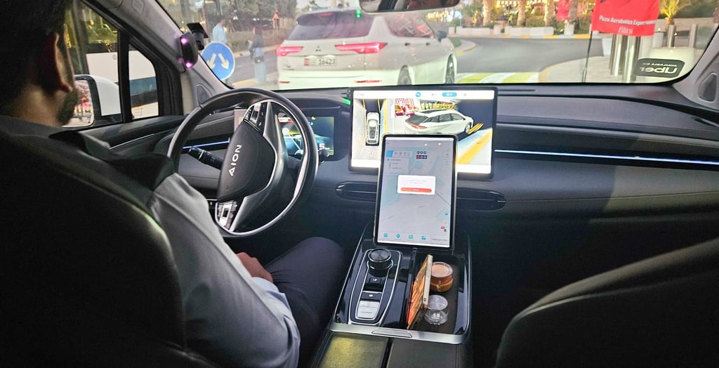 The interior of a WeRide robotaxi with a safety operator. Photo: Coco Feng