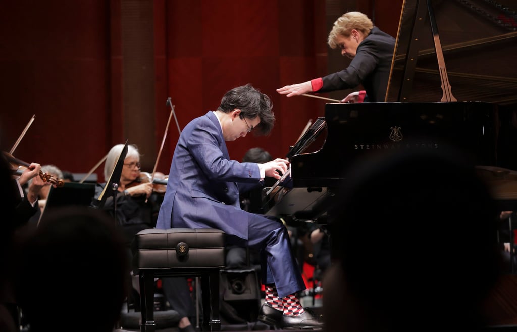 Aristo Sham (centre) plays with conductor Marin Alsop and the Fort Worth Symphony at the Van Cliburn International Piano Competition. Photo: Ralph Lauer Aristo Sham (centre) plays with conductor Marin Alsop and the Fort Worth Symphony at the Van Cliburn International Piano Competition. Photo: Ralph Lauer