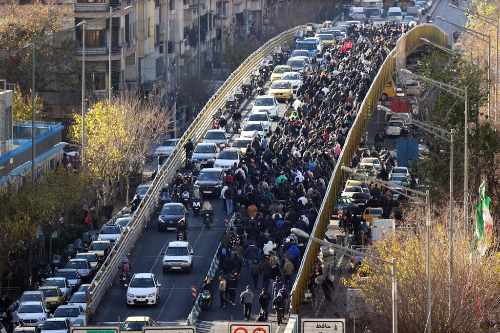 Iranian shopkeepers and traders protest in Tehran on Monday. Photo: EPA Iranian shopkeepers and traders protest in Tehran on Monday. Photo: EPA