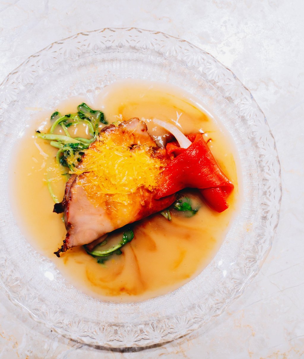 Ibérico pork collar with bell pepper atchara, watercress, pork gravy and mimolette, at Inato. Photo: Jocelyn Tam