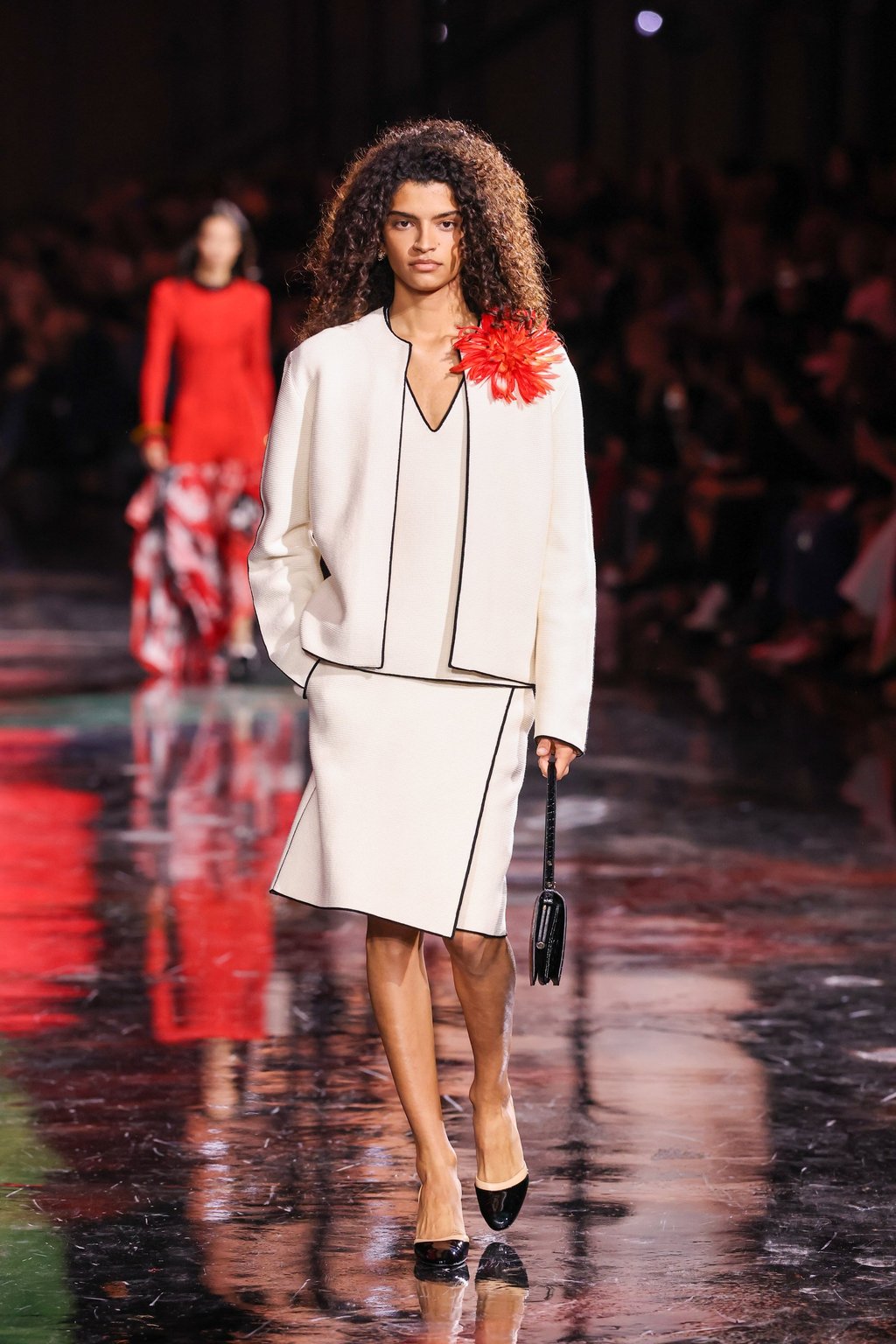 A model, wearing a brooch, walks the runway at the Chanel spring/summer 2026 show at Paris Fashion Week in October 2025, in Paris, France. Photo: Corbis via Getty Images