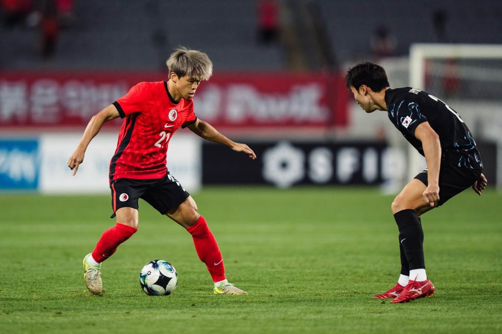 Yue Tze-nam (left) has left Meizhou Hakka to sign for Beijing Guoan. Photo: SCMP Yue Tze-nam (left) has left Meizhou Hakka to sign for Beijing Guoan. Photo: SCMP