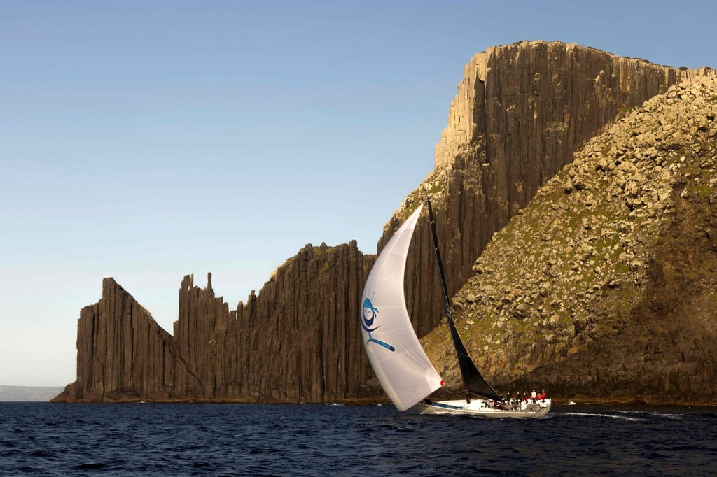No Limit sails near Tasman Island during the annual Sydney to Hobart yacht race. Photo: AFP No Limit sails near Tasman Island during the annual Sydney to Hobart yacht race. Photo: AFP