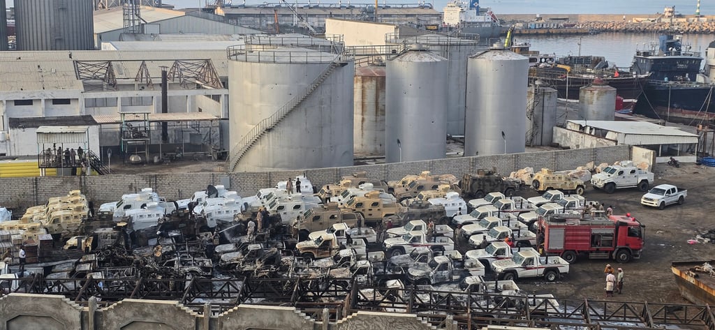 Damaged military vehicles following an air strike in Mukalla, southern Yemen. Photo: AFP
