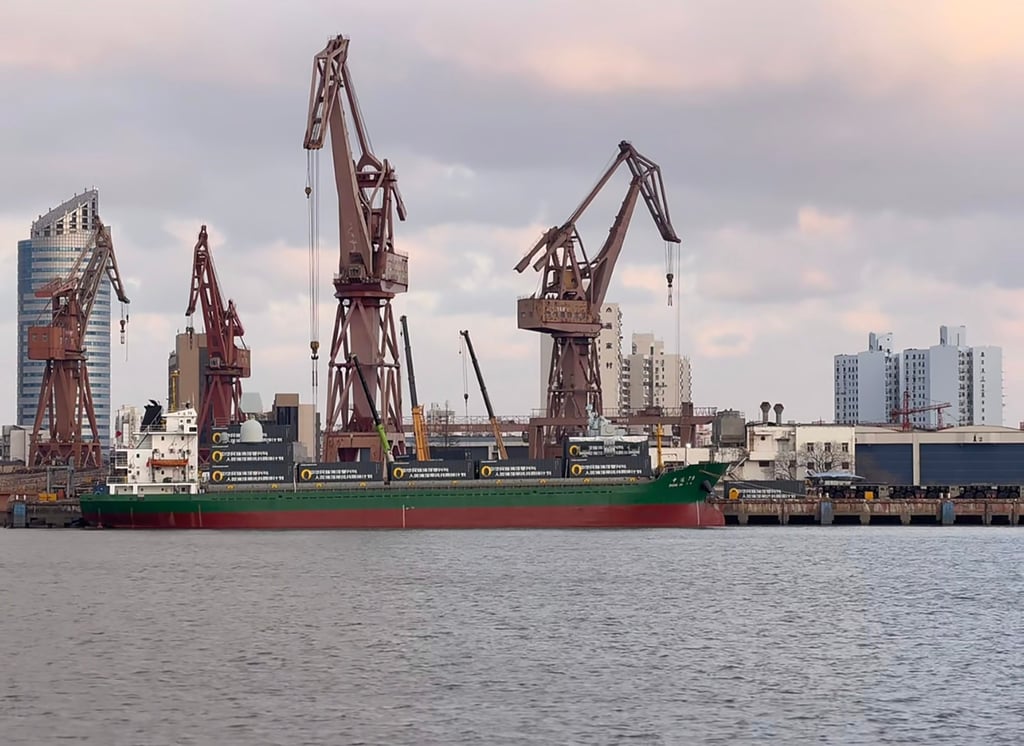 The cargo ship Zhong Da 79, with the three linked eight-wheeled low loaders and large drones visible on the dock. Photo: Handout
