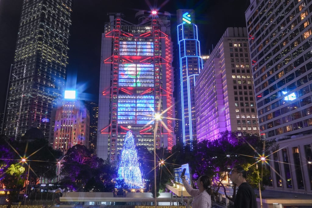Light projections of a giant countdown clock and a three-minute light performance will illuminate the facades of eight iconic buildings in Central. Photo: Eugene Lee