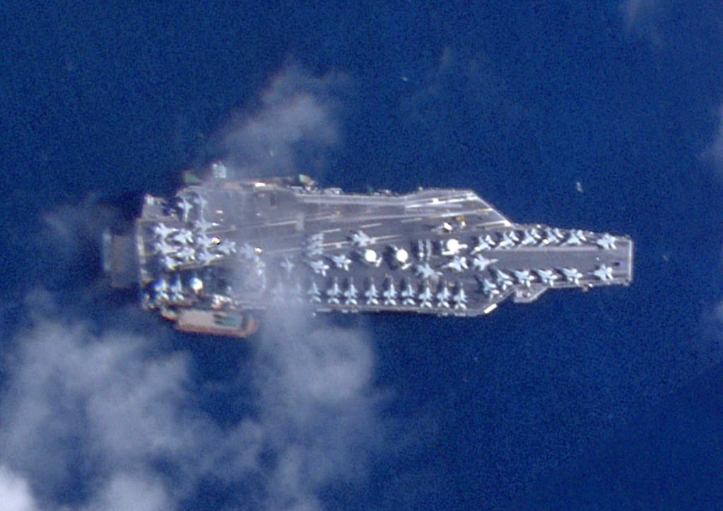The USS Gerald Ford, with at least 40 fighter jets on its deck, off the coast of Saint Thomas, US Virgin Islands on December 3. Photo: Planet Labs PBC via AFP