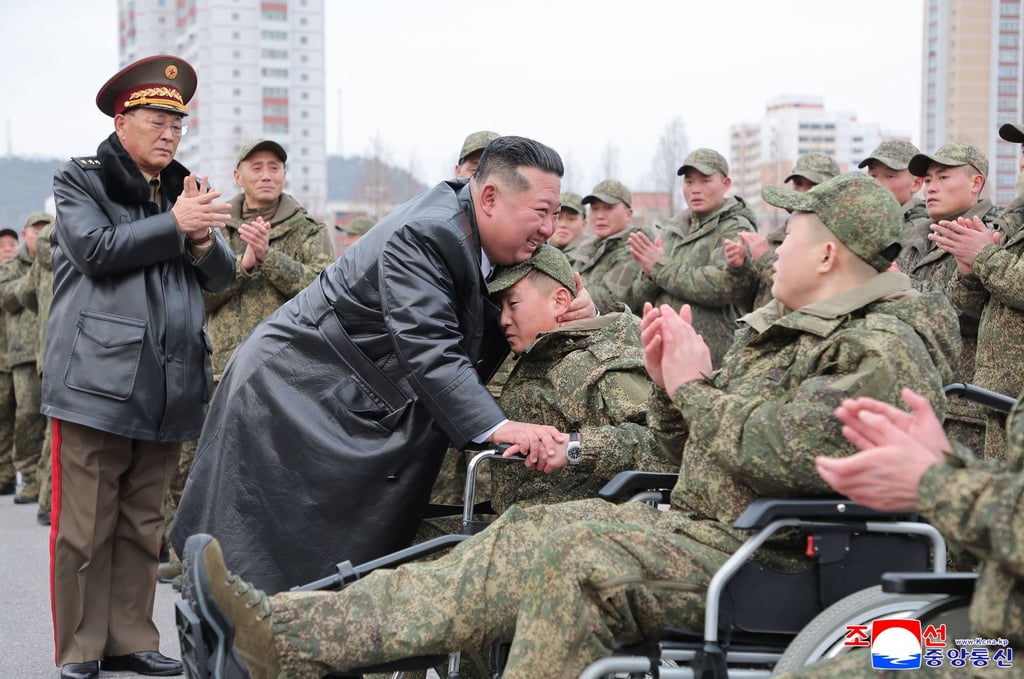 North Korean leader Kim Jong-un welcoming soldiers from the Korean People’s Army’s 528th Regiment of Engineers, which returned from an overseas deployment in Russia’s Kursk region, in Pyongyang on December 12, 2025. Photo: KCNA via KNS /AFP