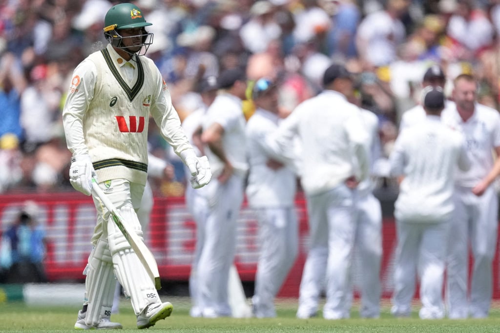 Usman Khawaja leaves the field after being dismissed by England’s Gus Atkinson in the fourth Test. Photo: Reuters