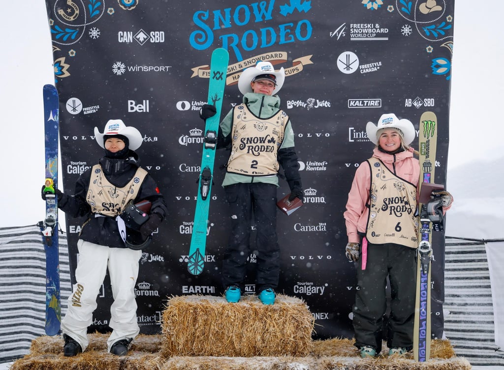Indra Brown, centre, with second place Zhang Kexin , left, and third Svea Irving. Photo: AP