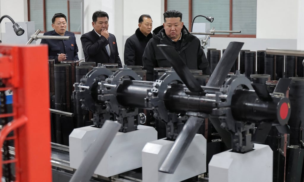 North Korean leader Kim Jong-un (right) inspects tactical guided weapons in production in a photo released on Sunday. Photo: KCNA/Reuters North Korean leader Kim Jong-un (right) inspects tactical guided weapons in production in a photo released on Sunday. Photo: KCNA/Reuters