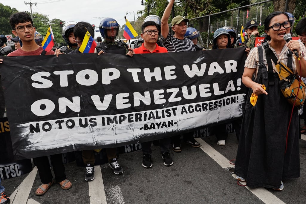 Protesters hold a banner outside the US Embassy in Manila on Monday during a rally opposing Washington’s military action in Venezuela following the seizure of President Nicolas Maduro. Photo: EPA-EFE Protesters hold a banner outside the US Embassy in Manila on Monday during a rally opposing Washington’s military action in Venezuela following the seizure of President Nicolas Maduro. Photo: EPA-EFE