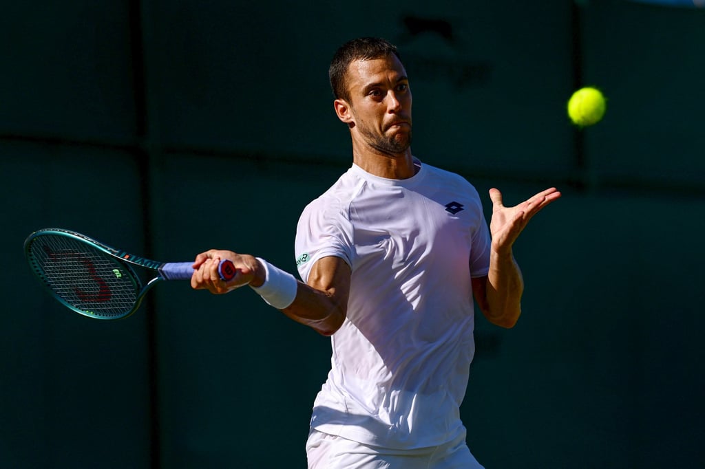 Laslo Djere plays a forehand against Andrey Rublev during their men’s singles first round clash at Wimbledon last summer. Photo: Getty Images