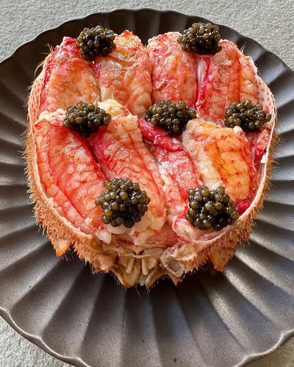 Hokkaido hairy crab brushed in clarified butter, topped with Regalis golden kaluga caviar. Photo: @regalisfoods/Instagram Hokkaido hairy crab brushed in clarified butter, topped with Regalis golden kaluga caviar. Photo: @regalisfoods/Instagram