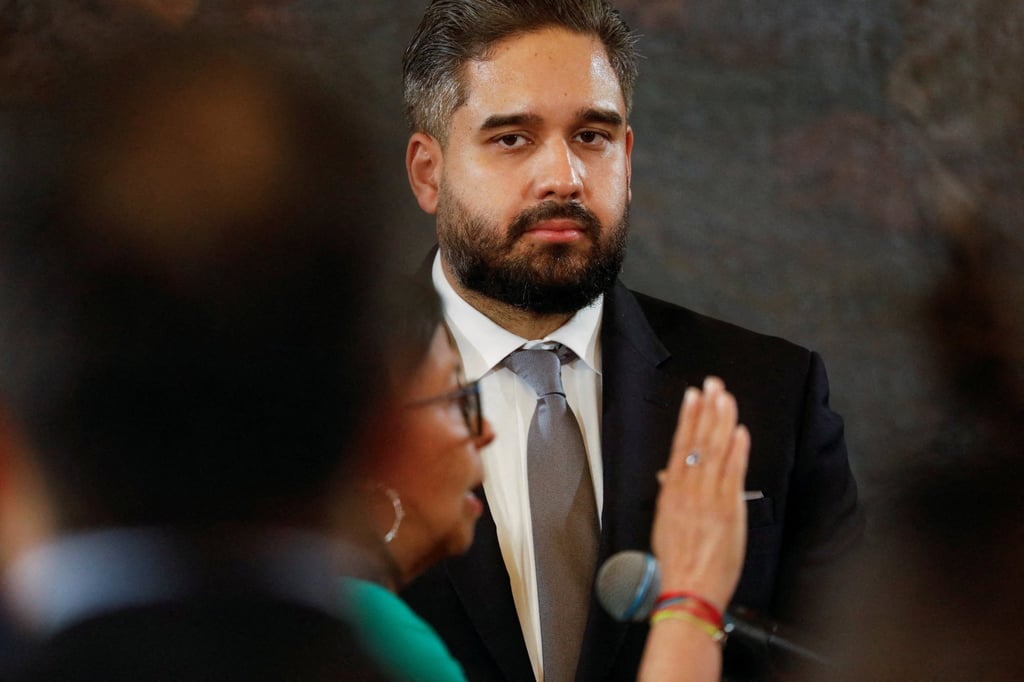 Vice-President Delcy Rodriguez is sworn in as Venezuela’s interim president while Nicolas Maduro Guerra, son of ousted President Nicolas Maduro looks on. Photo: Reuters