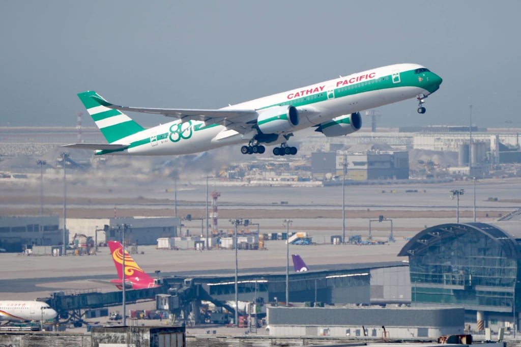 A Cathay Pacific A350 aircraft in the airline’s classic green and white livery takes off at Hong Kong International Airport. Photo: Sam Tsang