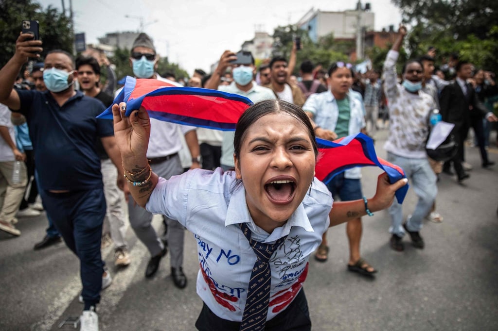 A demonstrator shouts slogans during a protest outside parliament in Kathmandu, Nepal, in September condemning social media prohibitions and corruption by the government. Photo: AFP