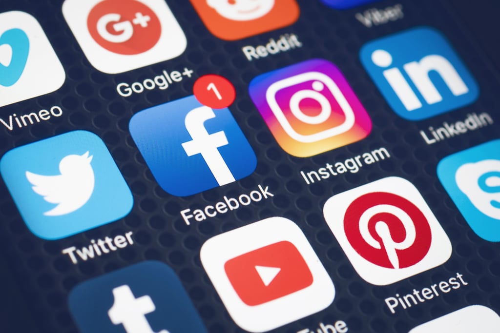 Social media icons on smartphone. The teenager used a fake account to deceive his victim into thinking they were in a romantic relationship. Photo: Shutterstock