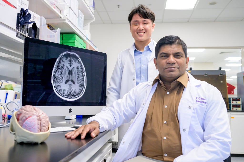 Justin Ong (back) of NTU’s Lee Kong Chian School of Medicine and associate professor Nagaendran Kandiah of Singapore’s Dementia Research Centre researched glymphatic channels – microscopic pathways that help remove waste and toxins from brain tissue – for the study. Photo: NTU Singapore