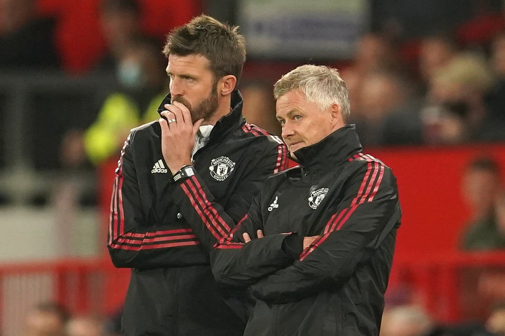 Carrick (left) had a previous stint as interim boss after the firing of Ole Gunnar Solskjaer (right). Photo: AP