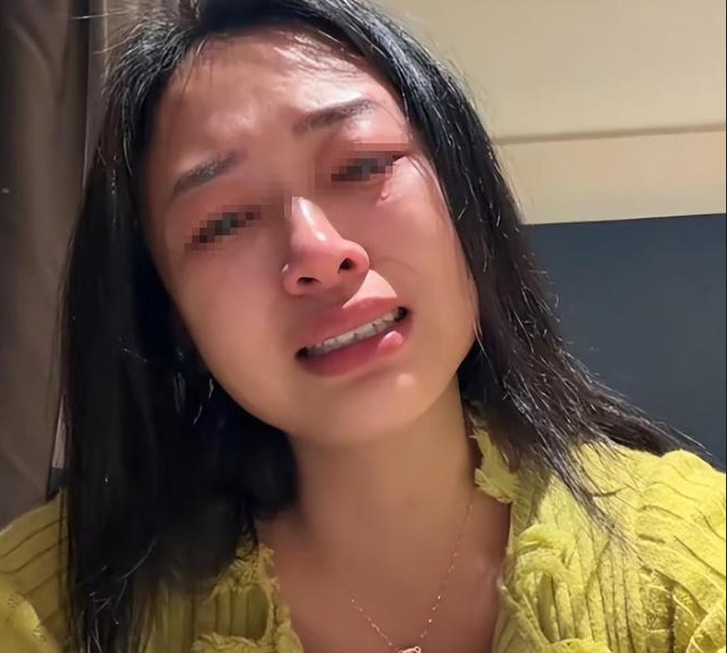 The distraught woman was left in tears after her husband’s violent outburst. Photo: 163.com