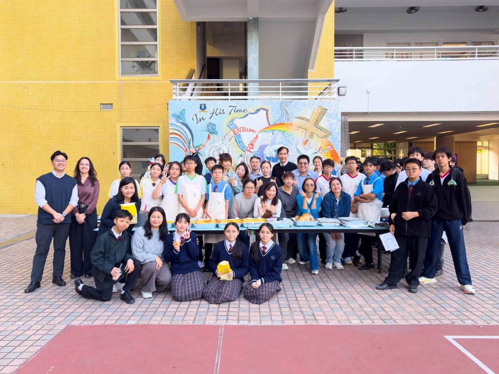 Students, teachers and volunteers gather for a photo at the school playground during their merry charity funfair. Photo: Handout Students, teachers and volunteers gather for a photo at the school playground during their merry charity funfair. Photo: Handout