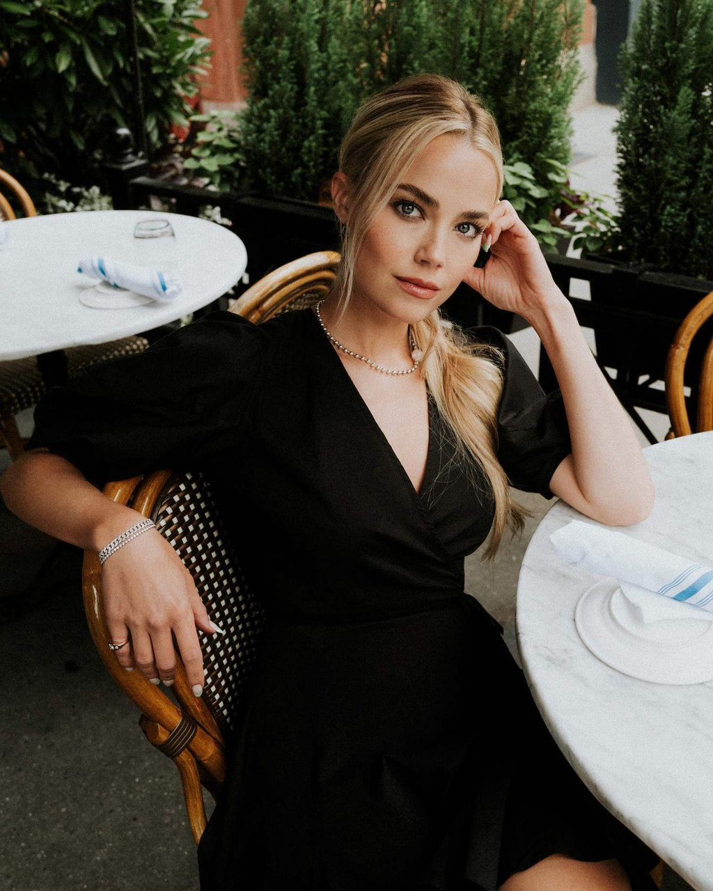 Rebecca Rittenhouse poses in a photo shoot for Rose & Ivy. Photo: @rebeccarittenhouse/Instagram