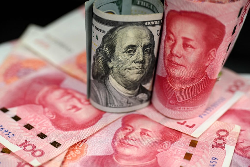 This photo illustration shows Chinese yuan and US dollar notes in Beijing on April 8, 2025. Photo: AFP This photo illustration shows Chinese yuan and US dollar notes in Beijing on April 8, 2025. Photo: AFP