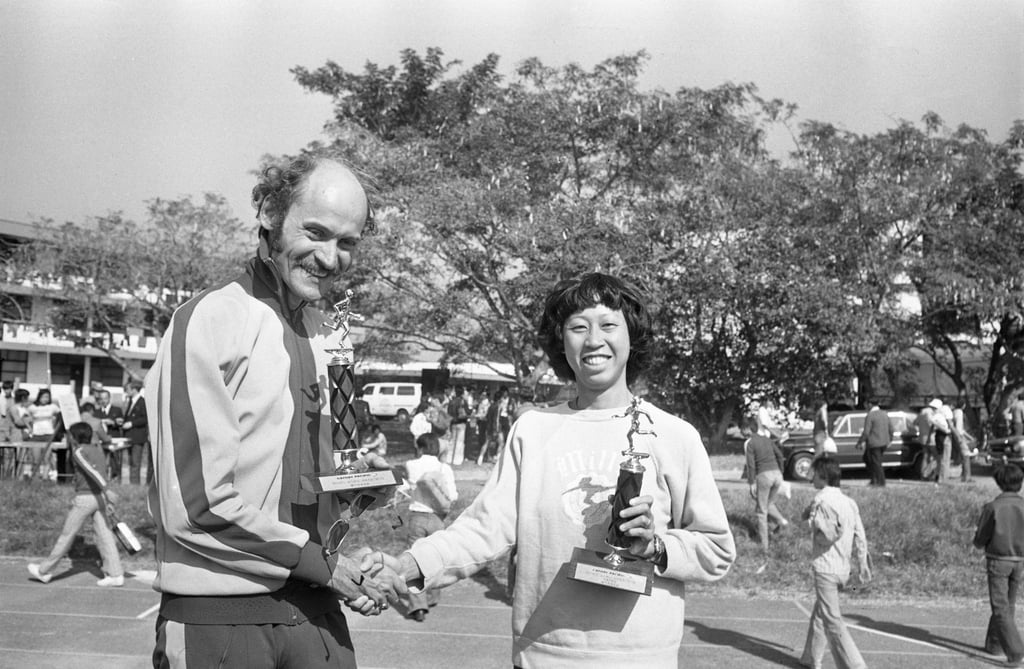 Adrian Trowell and Sandra Fung, winners of the men’s and women’s titles in the Cathay Pacific Marathon held in Shek Kong, congratulate each other after the race on December 4, 1977. Photo: SCMP
