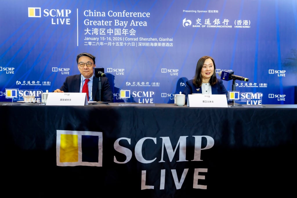 More than 300,000 Hong Kong residents are expected to seek medical care in Shenzhen this year, says Qu Hongbin, chief economic adviser to the Shenzhen Qianhai Authority, who is seen with Tammy Tam, publisher of the Post. Photo: SCMP