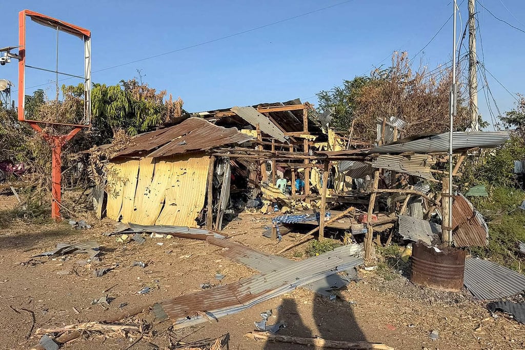 A view of damaged houses following clashes between Cambodian and Thai soldiers, in Chouk Chey village in Banteay Meanchey province, on January 2. Photo: Agence Kampuchea Press / AFP