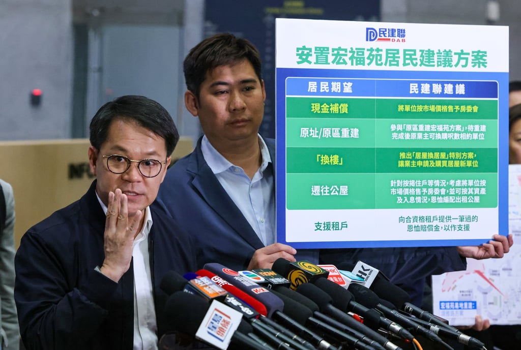 Democratic Alliance for the Betterment and Progress of Hong Kong (DAB) chairman Gary Chan Hak-kan and fellow members speak to the media after tabling a Wang Fuk Court redevelopment proposal to Deputy Financial Secretary Michael Wong Wai-lun, at the government headquarters in Tamar on December 10. Photo: Nora Tam