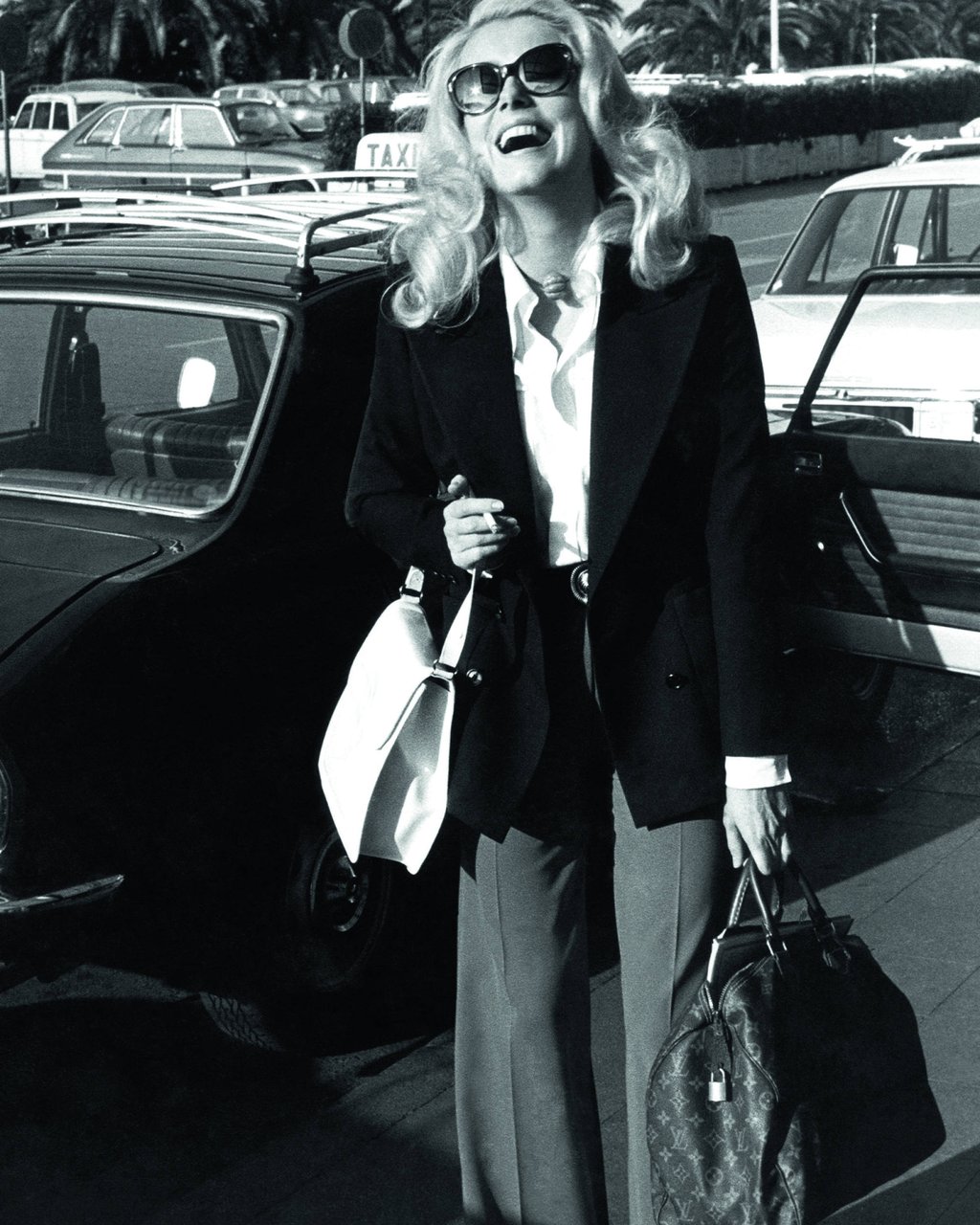 Actress Catherine Deneuve with a Louis Vuitton bag. Photo: Handout Actress Catherine Deneuve with a Louis Vuitton bag. Photo: Handout