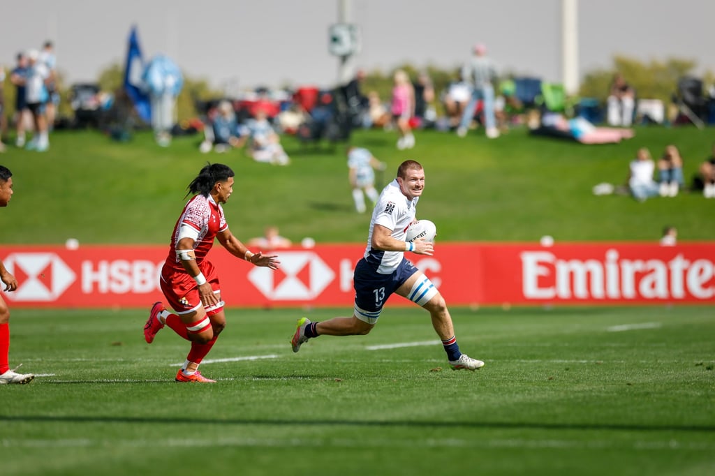Liam Herbert dashes for the line during Hong Kong’s victory over Tonga. Photo: World Rugby