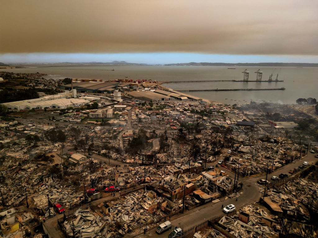 Concepcion, Chile, in the aftermath of a forest fire in the Biobio region. Photo: Reuters Concepcion, Chile, in the aftermath of a forest fire in the Biobio region. Photo: Reuters