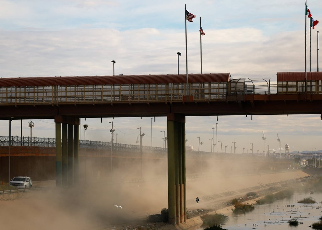 A US Border Patrol vehicle conducts surveillance near the border wall between the United States and Mexico on January 12. Photo: Reuters