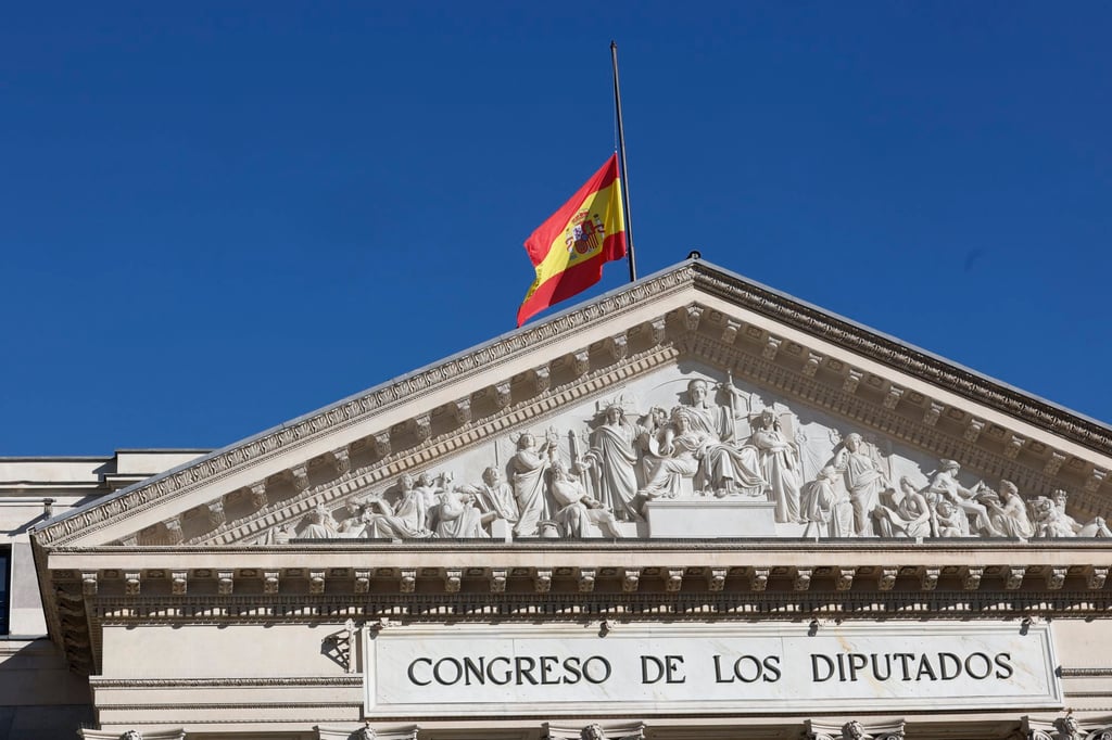 The Spanish flag flies at half-staff at the Lower House in Madrid, Spain on Monday, honouring the victims of a deadly train collision near Adamuz, Cordoba. Photo: EPA The Spanish flag flies at half-staff at the Lower House in Madrid, Spain on Monday, honouring the victims of a deadly train collision near Adamuz, Cordoba. Photo: EPA