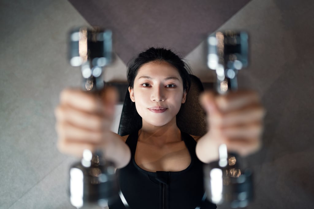 A woman exercises in a gym. Xiaoyu developed her own “extreme” weight loss plan. Photo: Getty Images