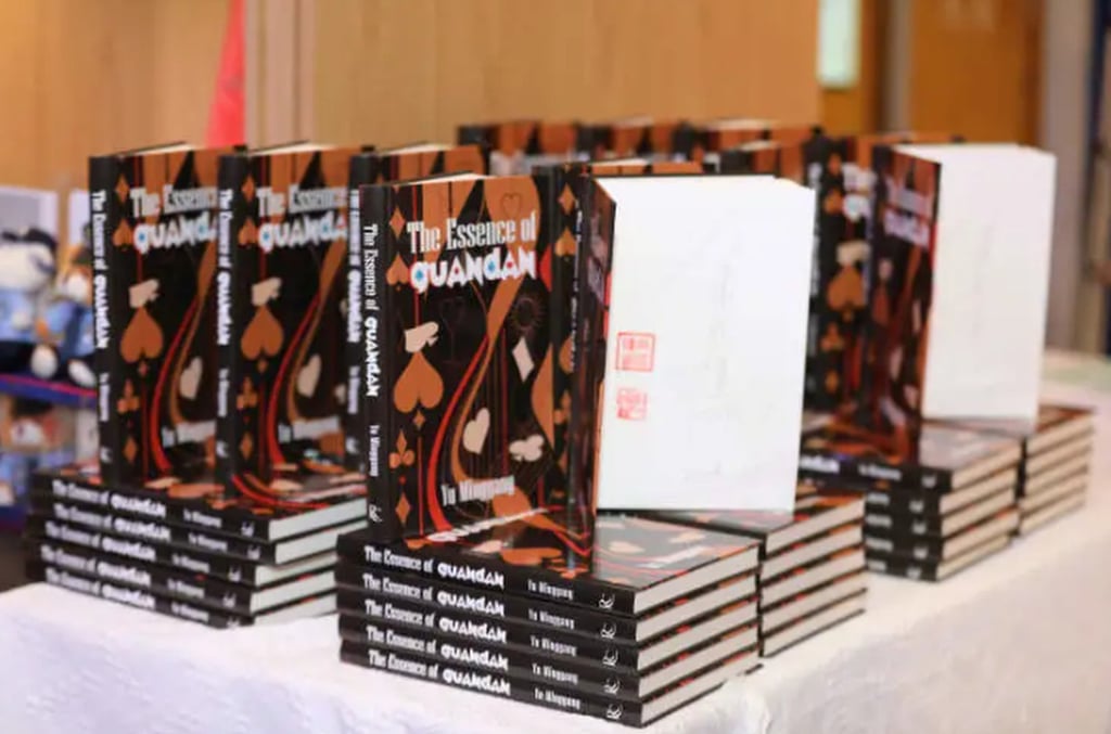 The English version of The Essence of Guandan, above, retails at about US$100. Photo: QQ.com The English version of The Essence of Guandan, above, retails at about US$100. Photo: QQ.com