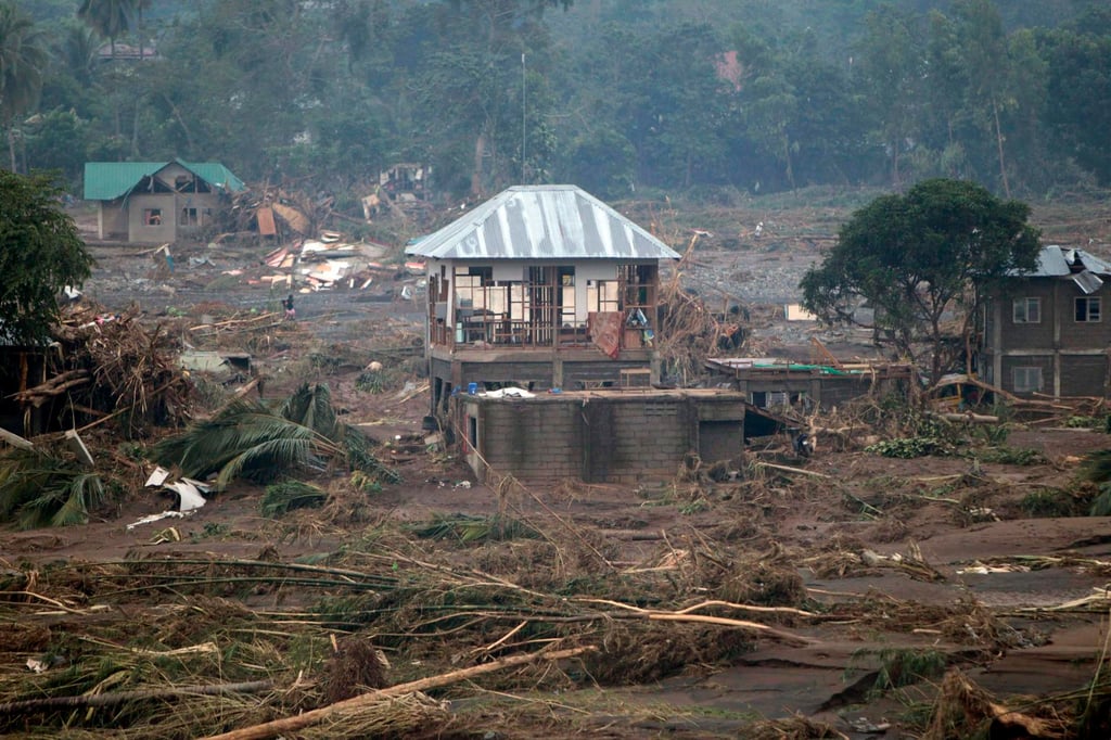 A town devastated by rampaging floodwaters in southern Mindanao, Philippines, on December 17, 2011, after tropical storm Washi slammed into the region. Photo: EPA