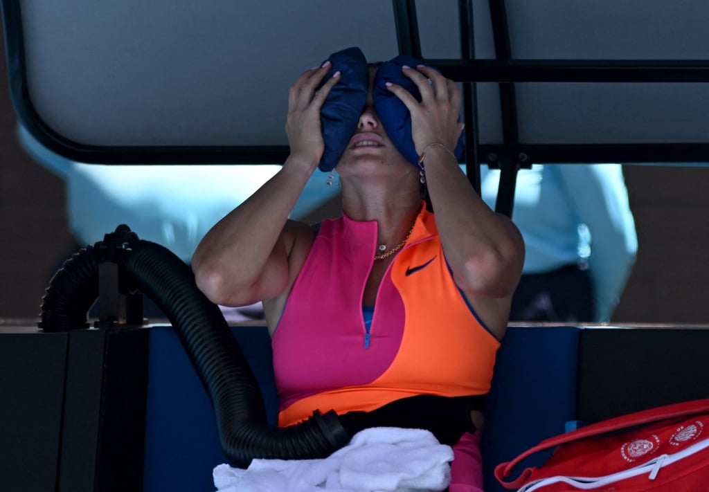 Belarus’ Aryna Sabalenka places ice packs on her head to cool off during a break in play in her quarter-final match against Iva Jovic of the US on Tuesday. Photo: Reuters